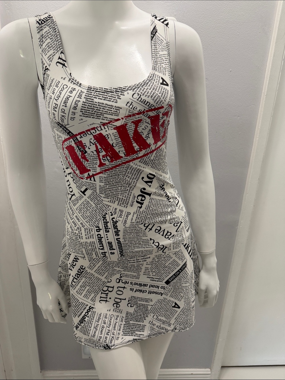 Yandy.com Newsprint 'FAKE' News Scoop Neck Mini Dress